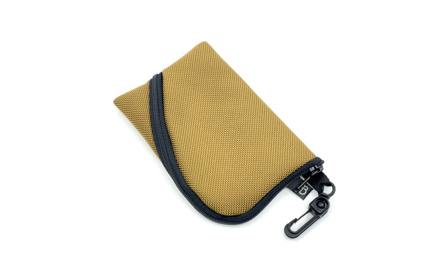 A Mini Ghost Whale Pouch in Coyote.